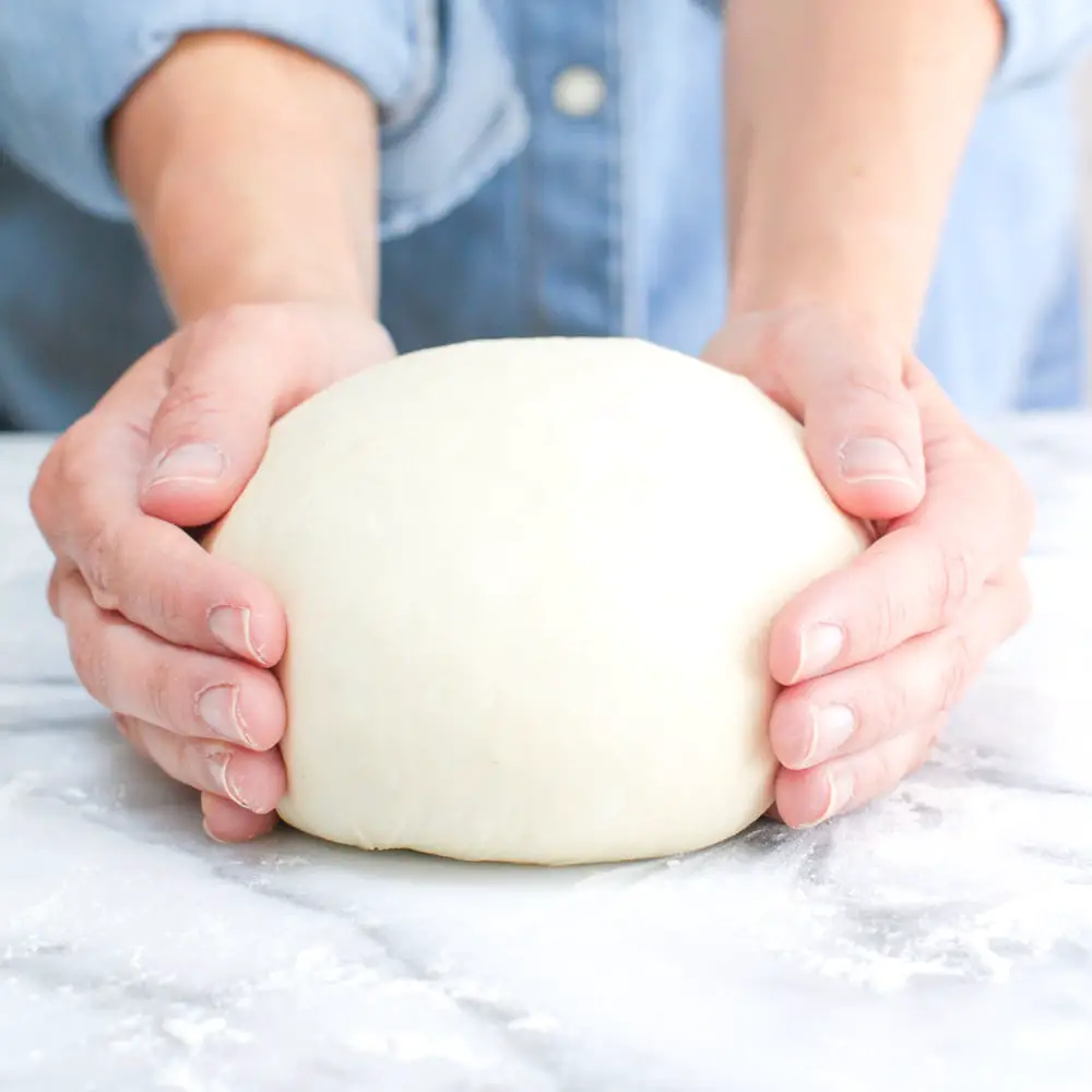 Make Testy and Homemade quick pizza dough in 7 steps